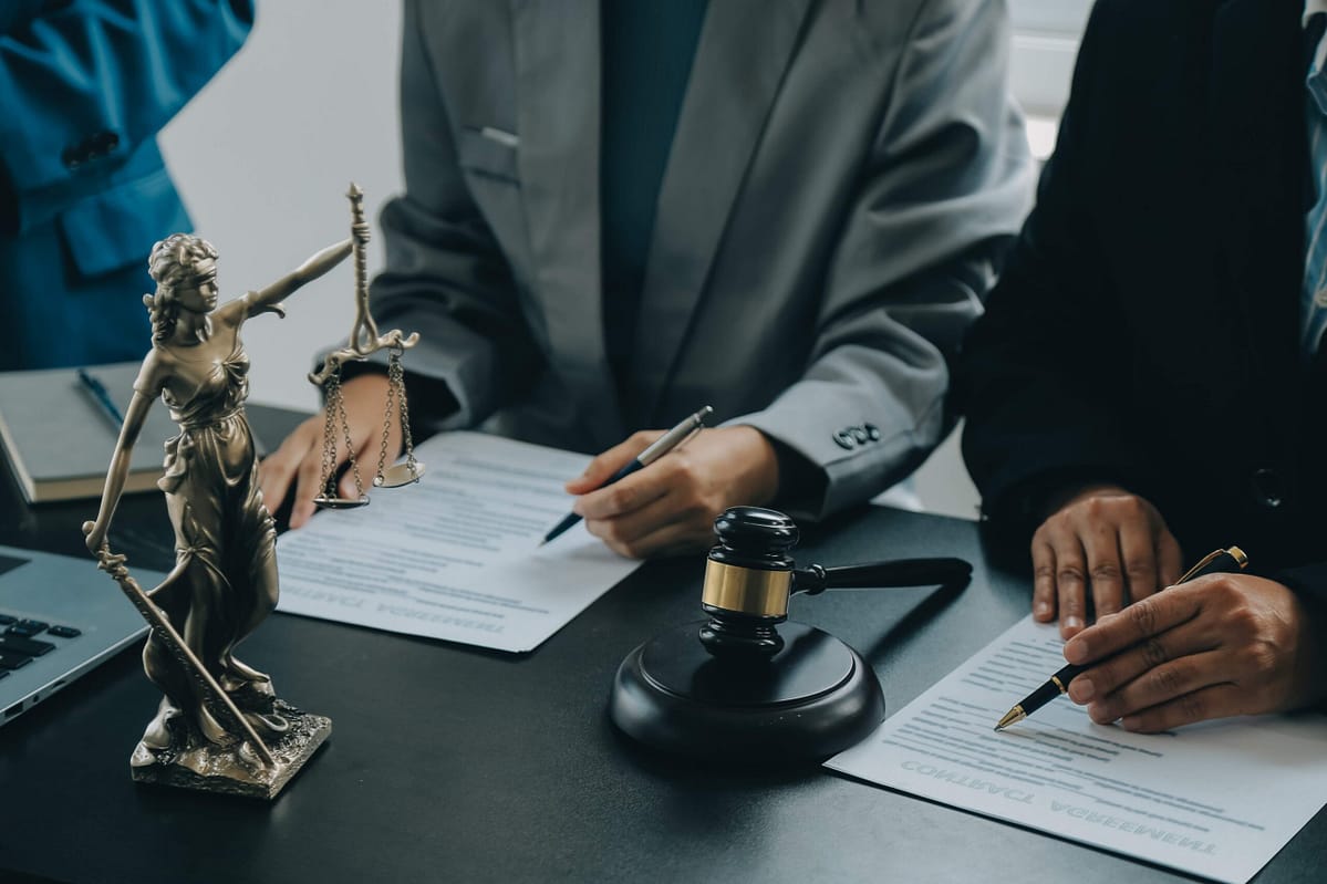 Jpeg-Optimizer_Business-Lawyers-Discussing-Contract-Papers-With-Brass-Scale-Desk-Office-Law-Legal-Services-Advice-Justice-Law-Concept-Picture-With-Film-Grain-Effect (2) Credibility and Reliability in Sexual Assault Cases